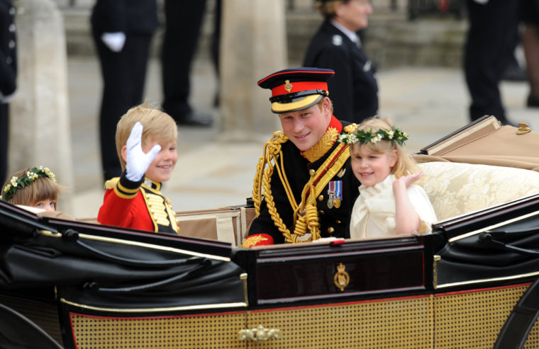 Britain's Prince Harry (2nd R), travels